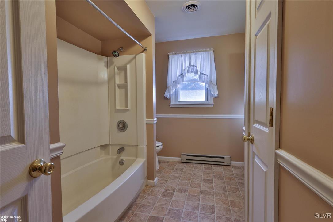 2629 Beacon Road Bath, PA 18014 - Photo 15 of 40 a bathroom with a bathtub and a shower