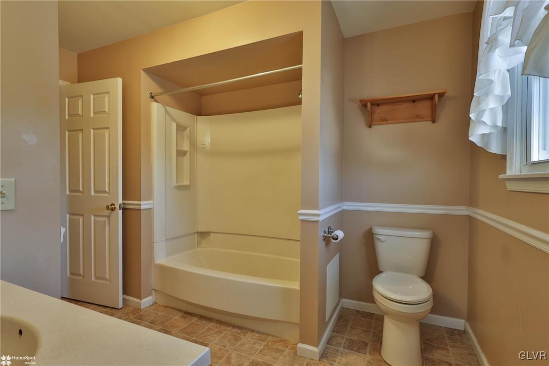 2629 Beacon Road Bath, PA 18014 - Photo 16 of 40 a bathroom with a toilet and a tub