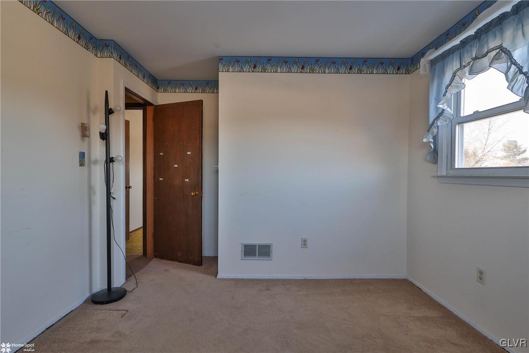 2629 Beacon Road Bath, PA 18014 - Photo 20 of 40 an empty room with windows and closet