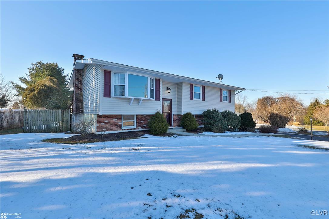 2629 Beacon Road Bath, PA 18014 - Photo 2 of 40 a front view of a house with a yard and garage