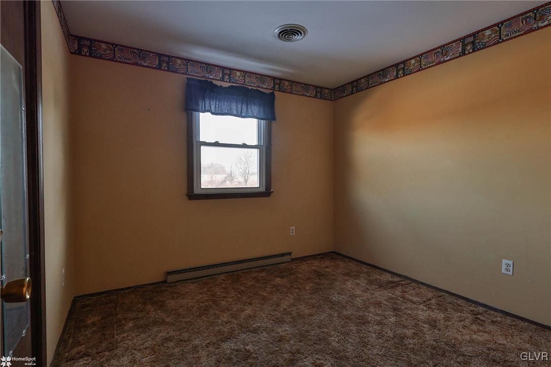 2629 Beacon Road Bath, PA 18014 - Photo 21 of 40 a view of an empty room with a window