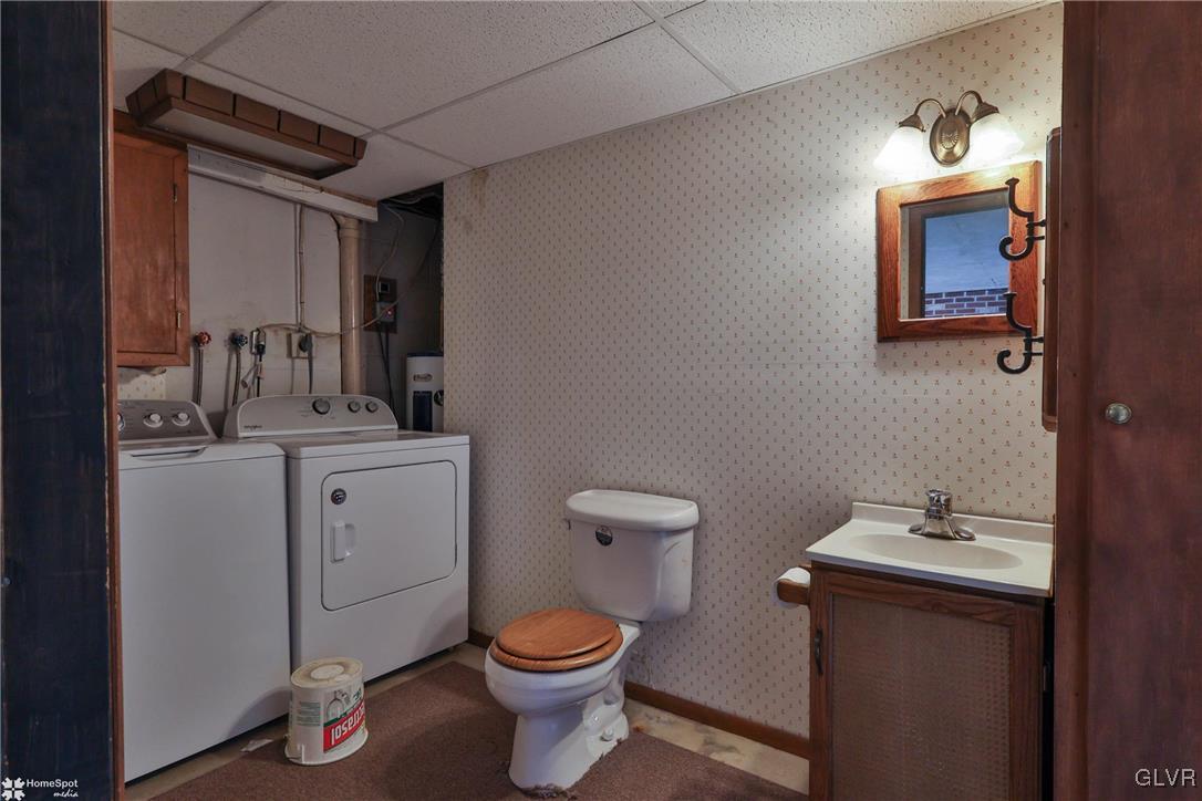 2629 Beacon Road Bath, PA 18014 - Photo 28 of 40 a bathroom with a toilet sink and mirror