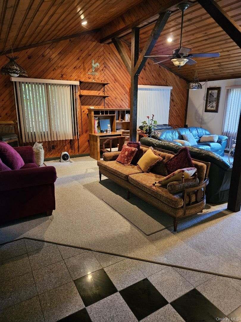 226 Park Road Johnsburg, NY 12843 - Photo 3 of 10 a outdoor space with patio couch and a ceiling fan