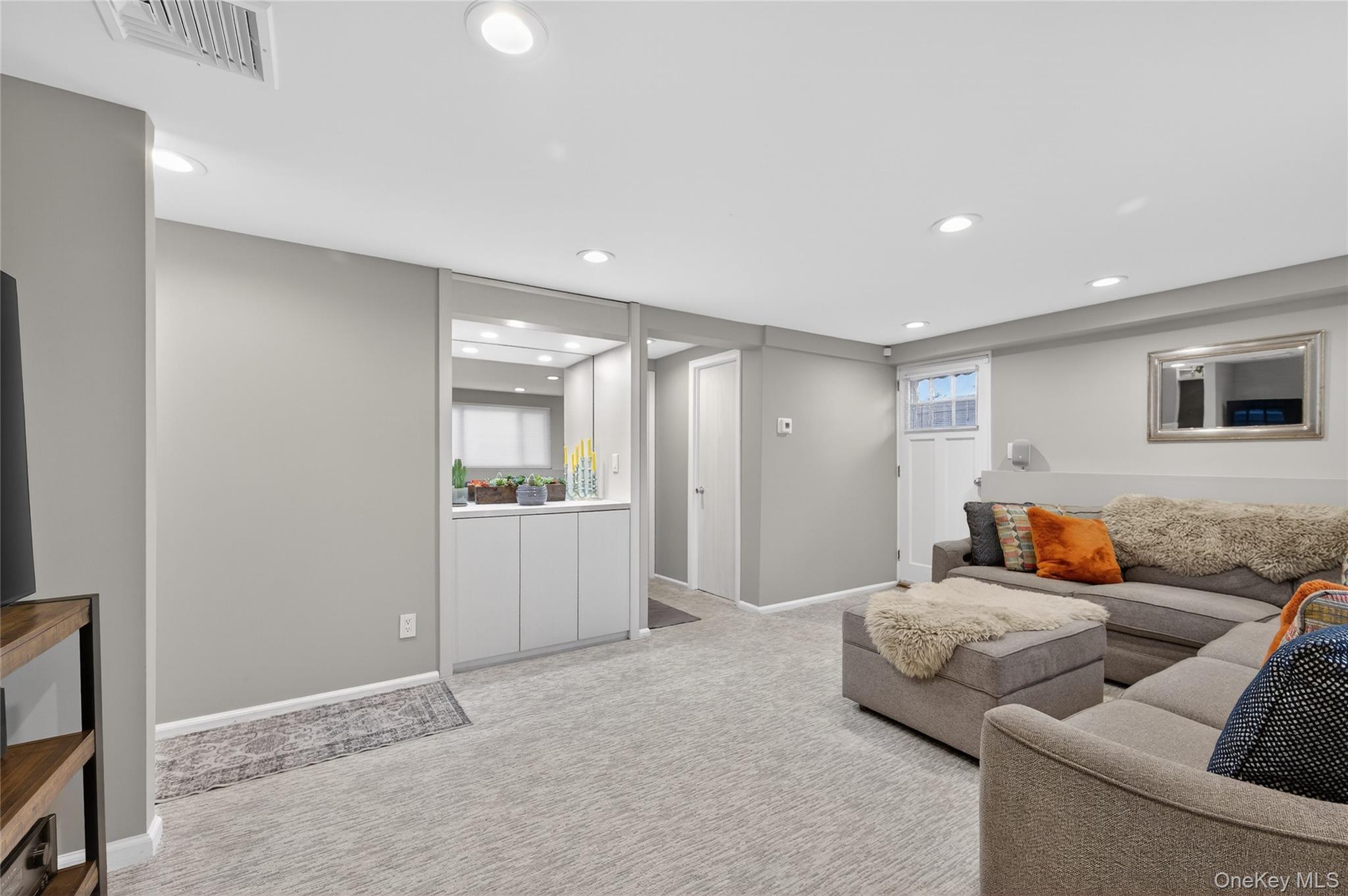 6 Dale Avenue Syosset, NY 11791 - Photo 12 of 34 a living room with furniture and window