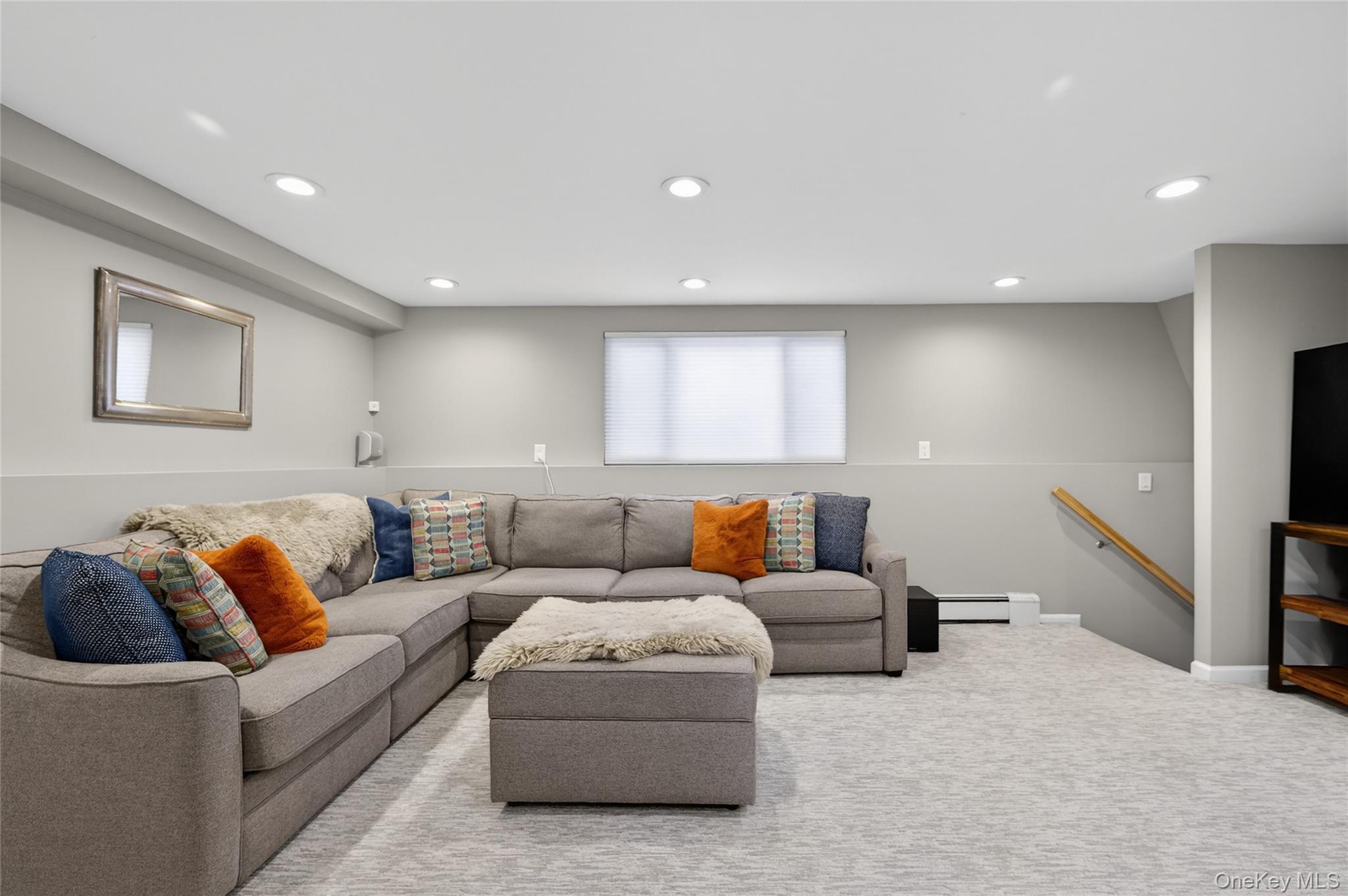 6 Dale Avenue Syosset, NY 11791 - Photo 15 of 34 a living room with furniture and a large window