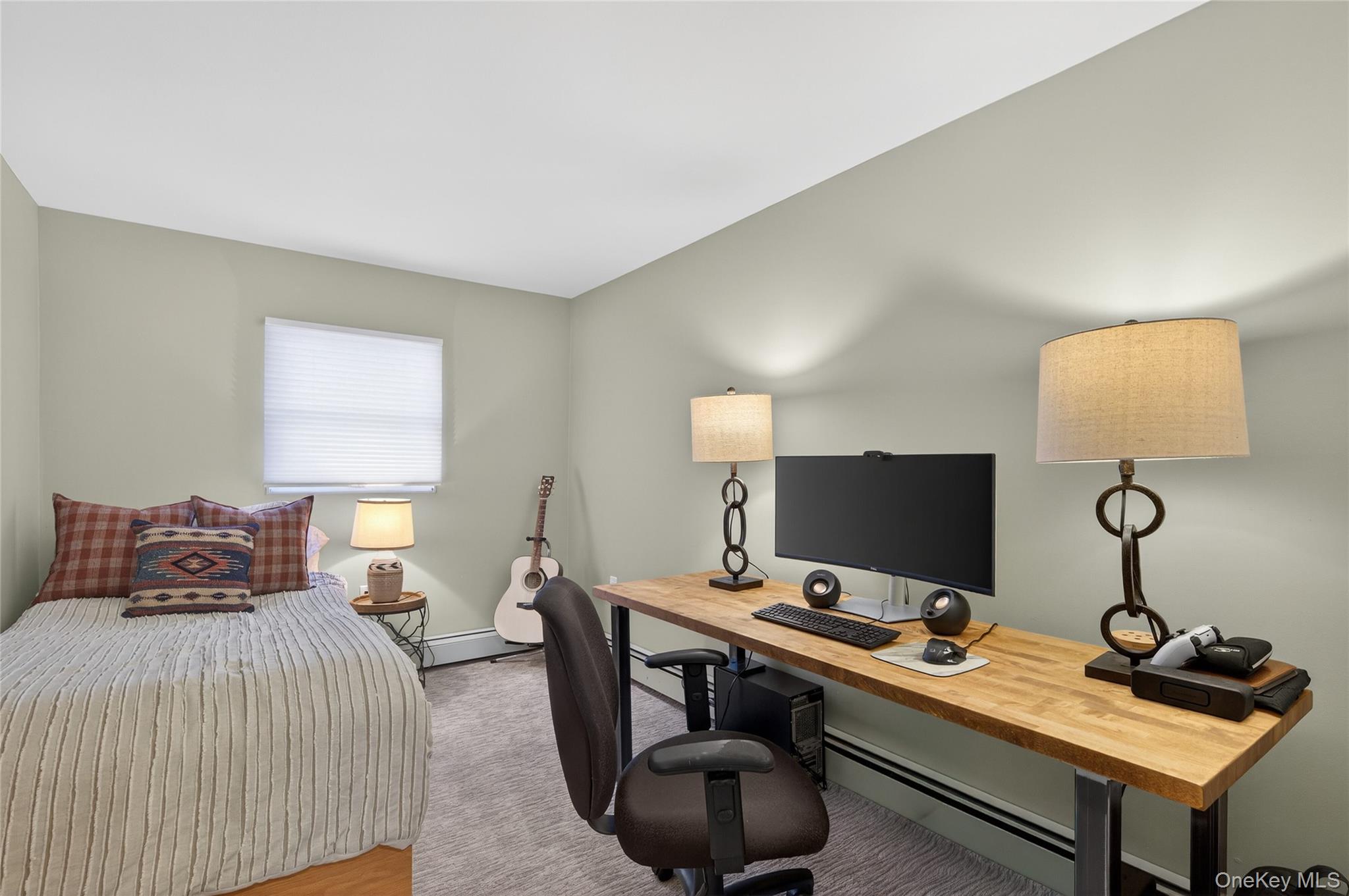 6 Dale Avenue Syosset, NY 11791 - Photo 23 of 34 a bedroom with a bed and a desk