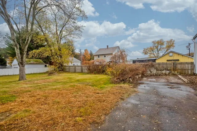 a view of a town with mountains in the background