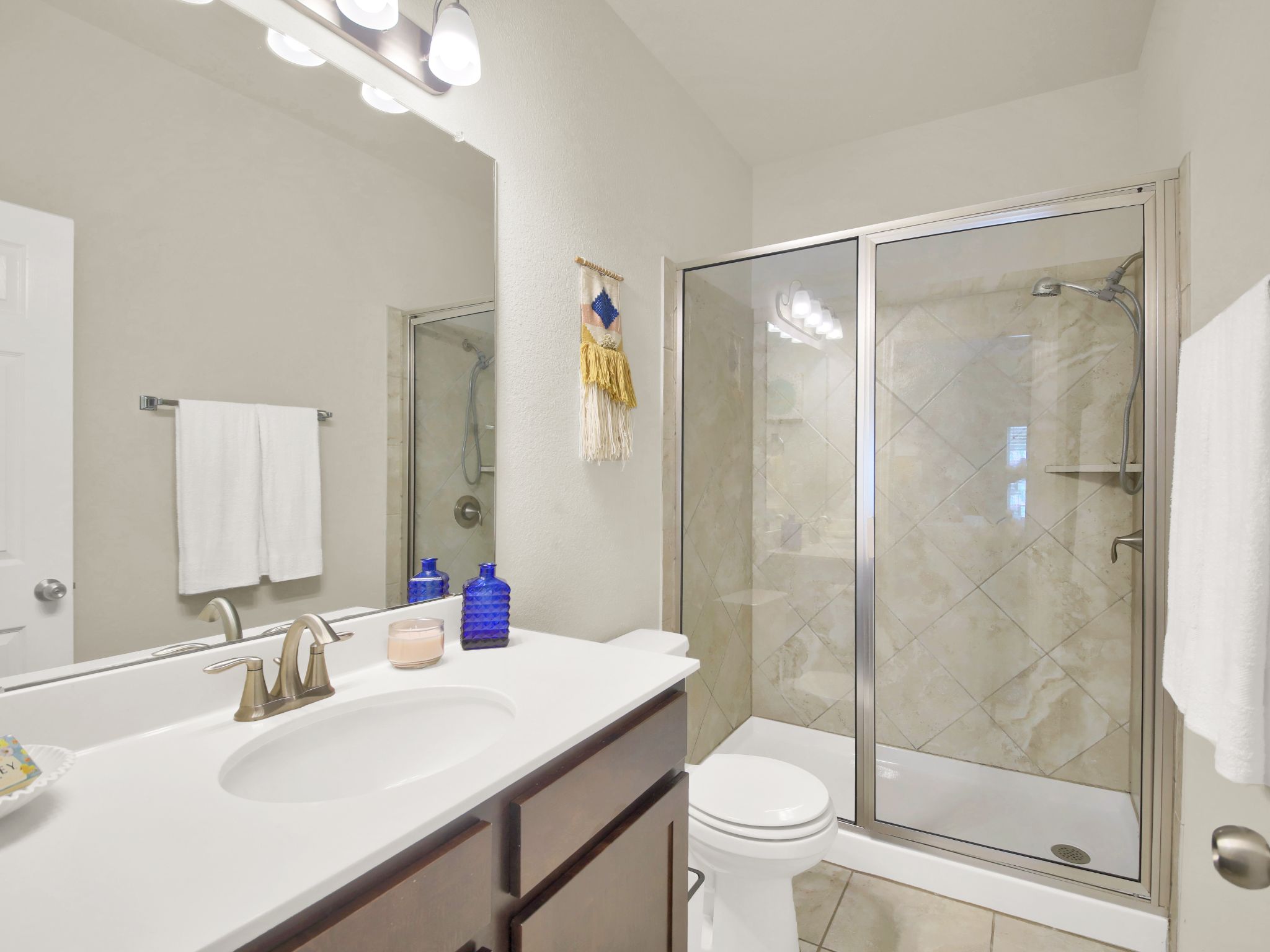1600 Airedale Road, Unit 2601 Austin, TX 78748 - Photo 15 of 26 A pristine full bathroom with a spacious walk-in shower and elegant vanity.