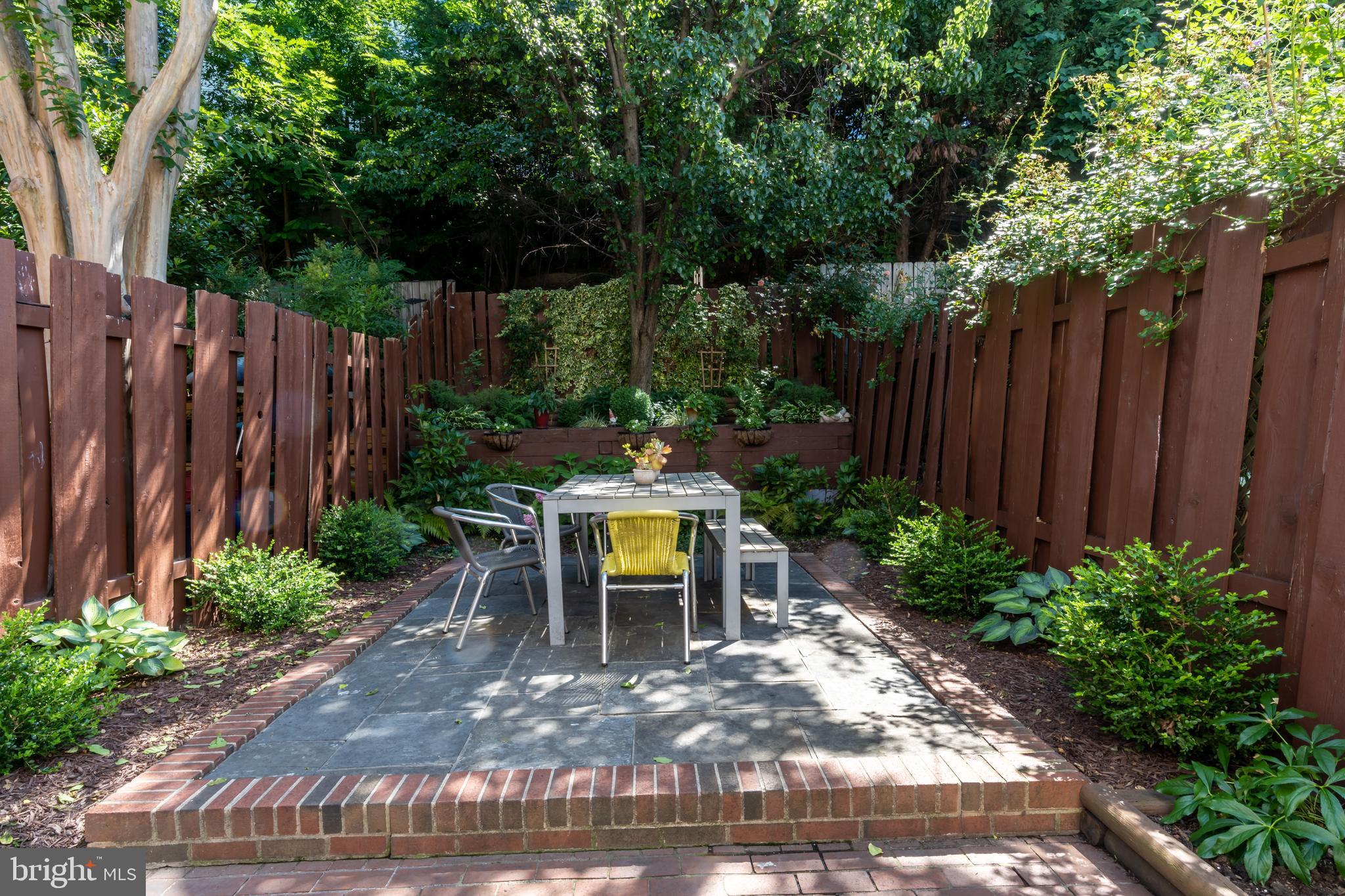 2205 Ontario Road Northwest Washington, DC 20009 - Photo 29 of 31 Privacy fence flanks this serene outdoor escape!
