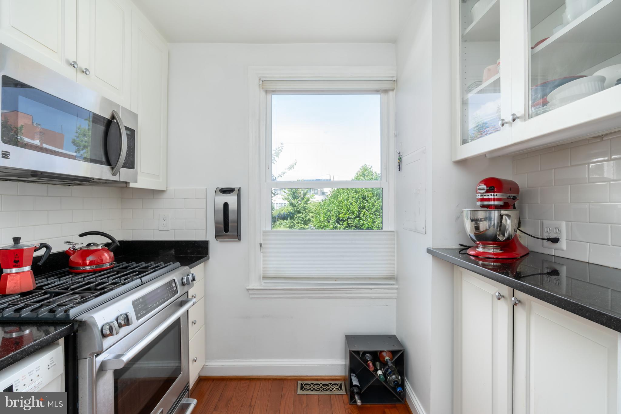 2205 Ontario Road Northwest Washington, DC 20009 - Photo 8 of 31 Kitchen window & subway tile add warmth!