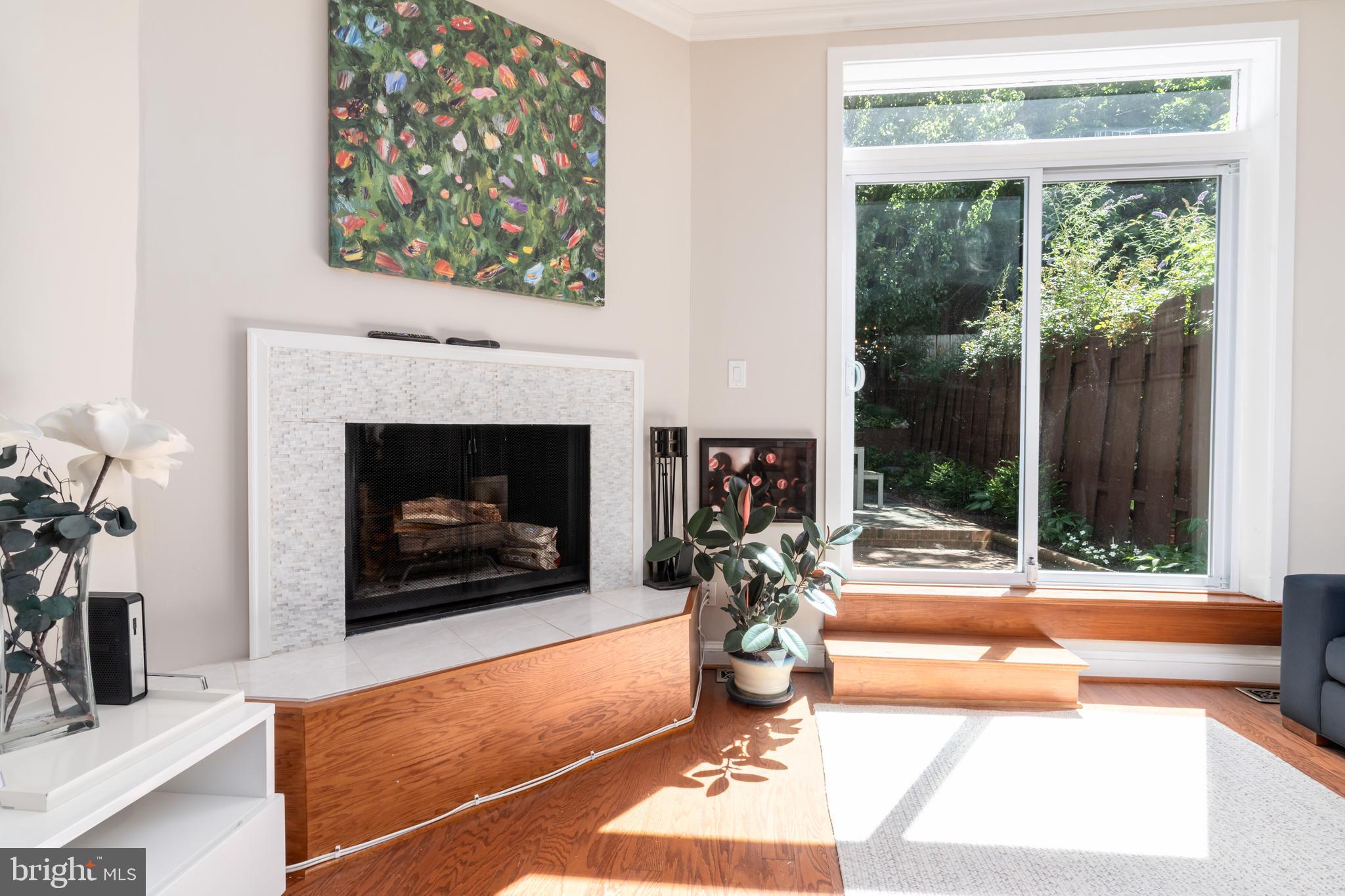 2205 Ontario Road Northwest Washington, DC 20009 - Photo 10 of 31 Living room with inviting wood burning fireplace