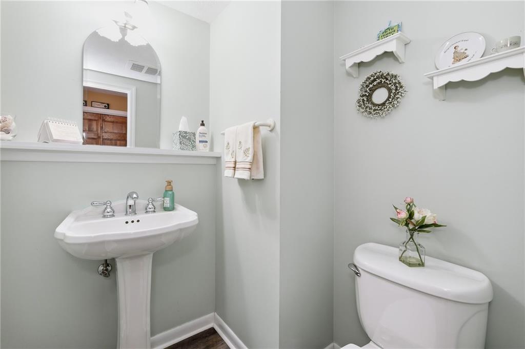 9403 Almar Place Pittsburgh, PA 15237 - Photo 12 of 50 The charmlingly update powder room is conveniently located on the main level.