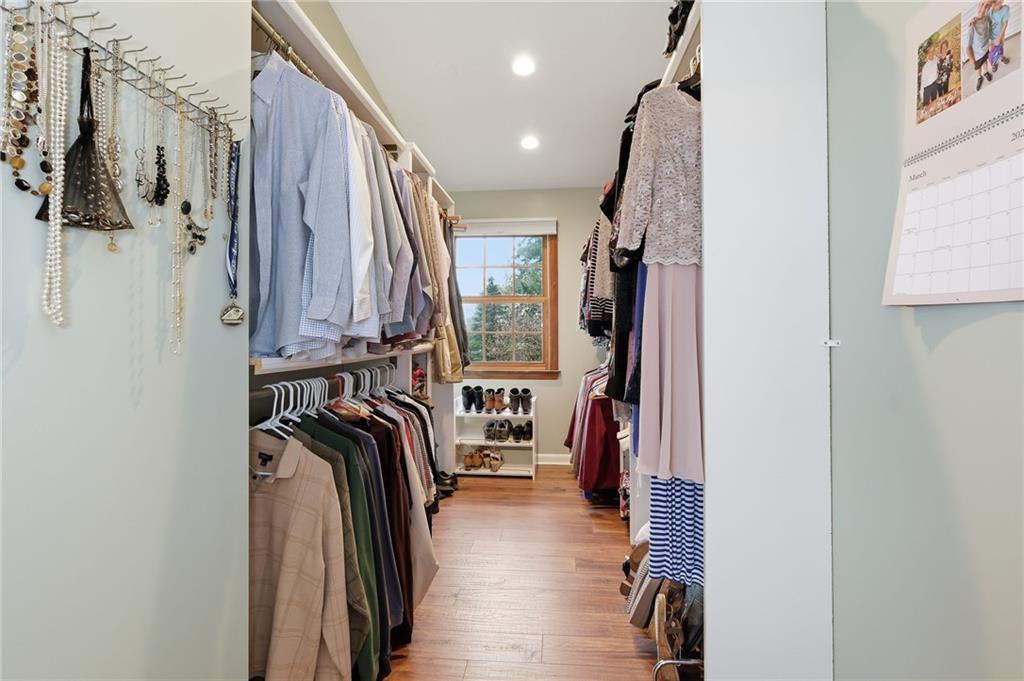 9403 Almar Place Pittsburgh, PA 15237 - Photo 15 of 50 Well organized, the walk-in closet features plenty of space as well as a window overlooking the fabulous backyard which provides desirable natural light