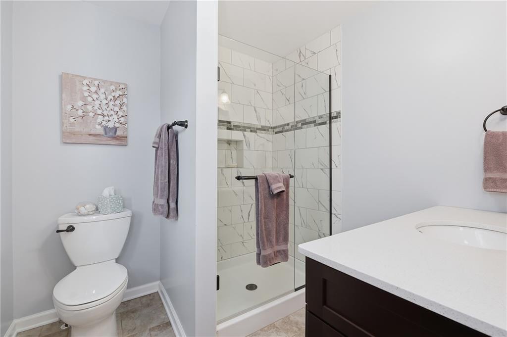 9403 Almar Place Pittsburgh, PA 15237 - Photo 21 of 50 Located off of bedroom 2, on the main living level, you'll find this fabulously updated full bathroom.