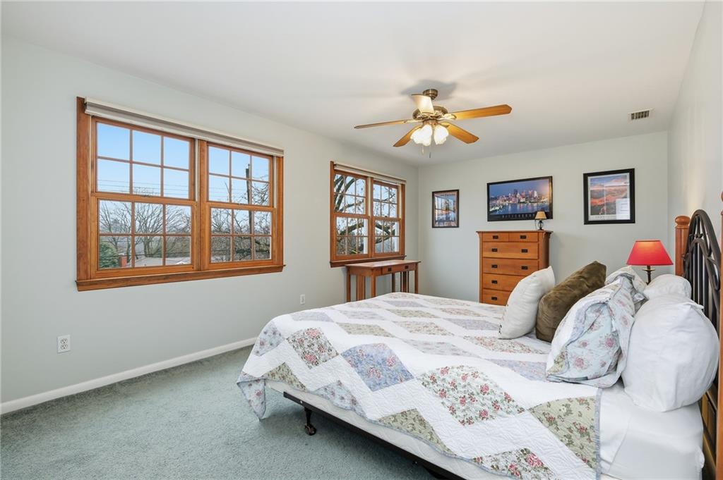 9403 Almar Place Pittsburgh, PA 15237 - Photo 22 of 50 Bedroom three is extremely generous in its sizing and features two large, Andersen windows overlooking the lovely neighborhood.