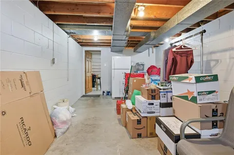 a view of storage and utility room with racks