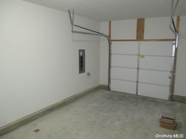 655 Bourdois Avenue Bellport, NY 11713 - Photo 13 of 28 a view of a garage