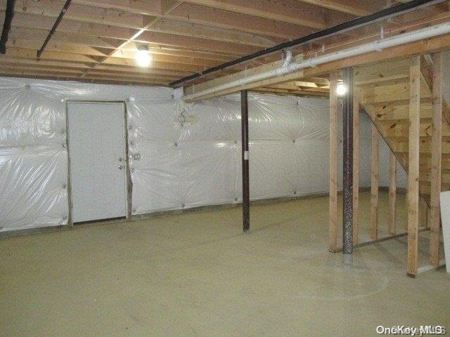 655 Bourdois Avenue Bellport, NY 11713 - Photo 26 of 28 a view of an empty room