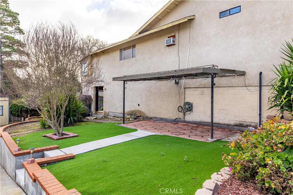 323 Crum Road Templeton, CA 93465 - Photo 45 of 59 Side yard with covered patio sitting area
