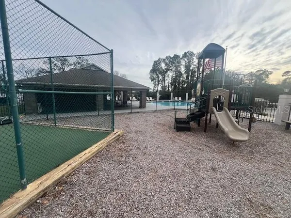 a view of a park with slide