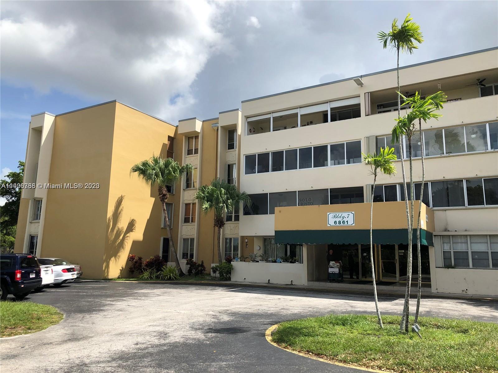 6861 Southwest 147th Avenue, Unit 2G Miami, FL 33193 - Photo 2 of 34 a house view with a outdoor space