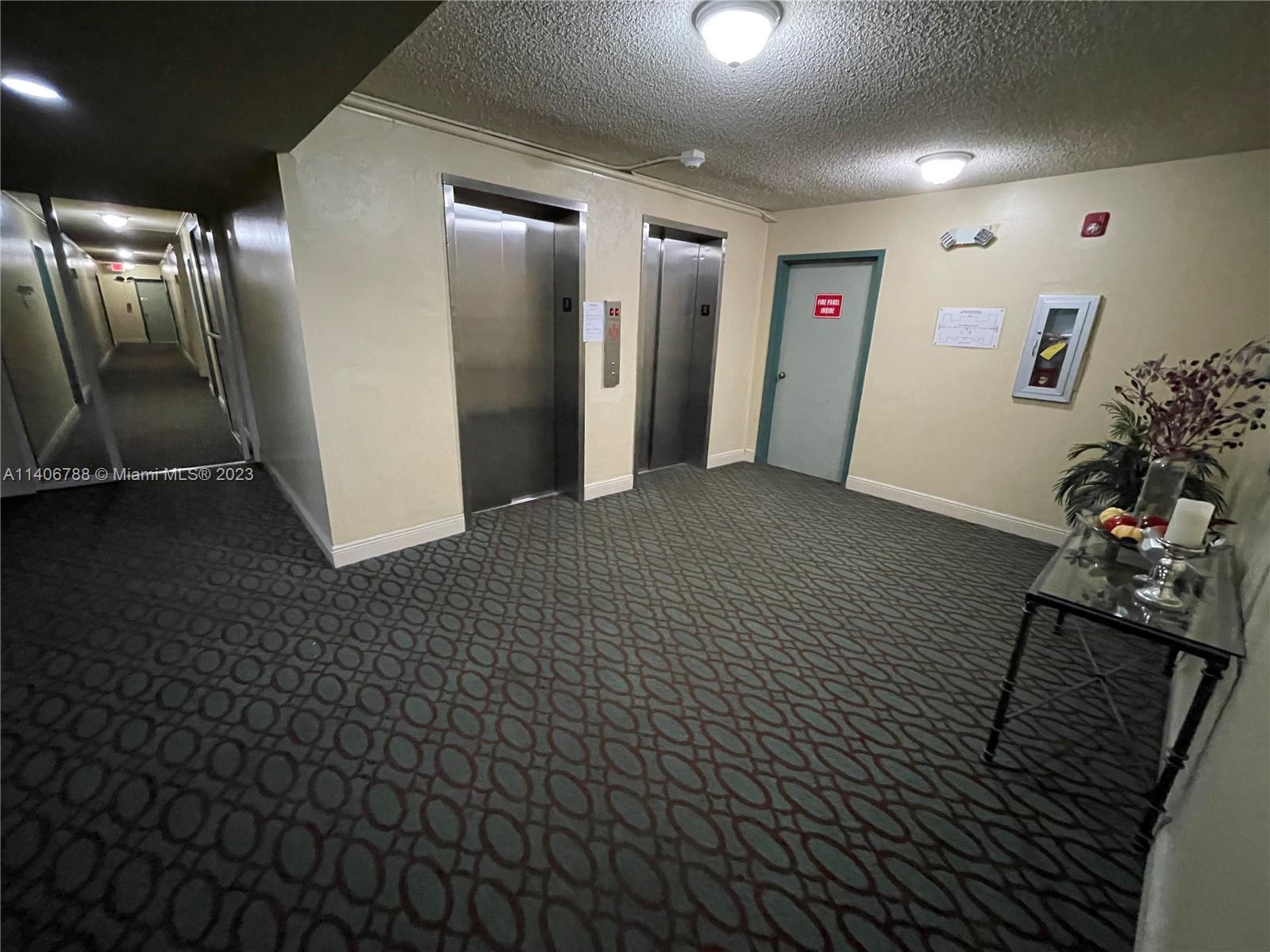 6861 Southwest 147th Avenue, Unit 2G Miami, FL 33193 - Photo 30 of 34 a view of hallway with a couch
