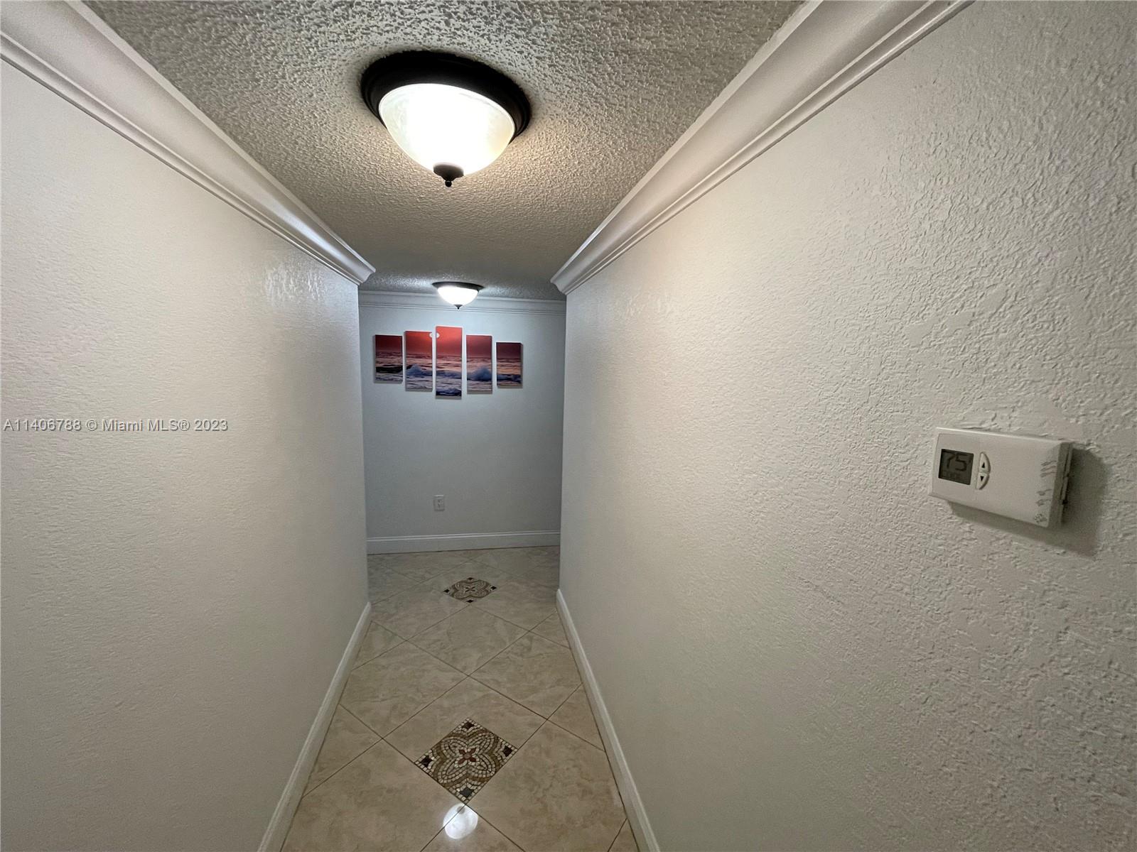6861 Southwest 147th Avenue, Unit 2G Miami, FL 33193 - Photo 4 of 34 an entryway of a house