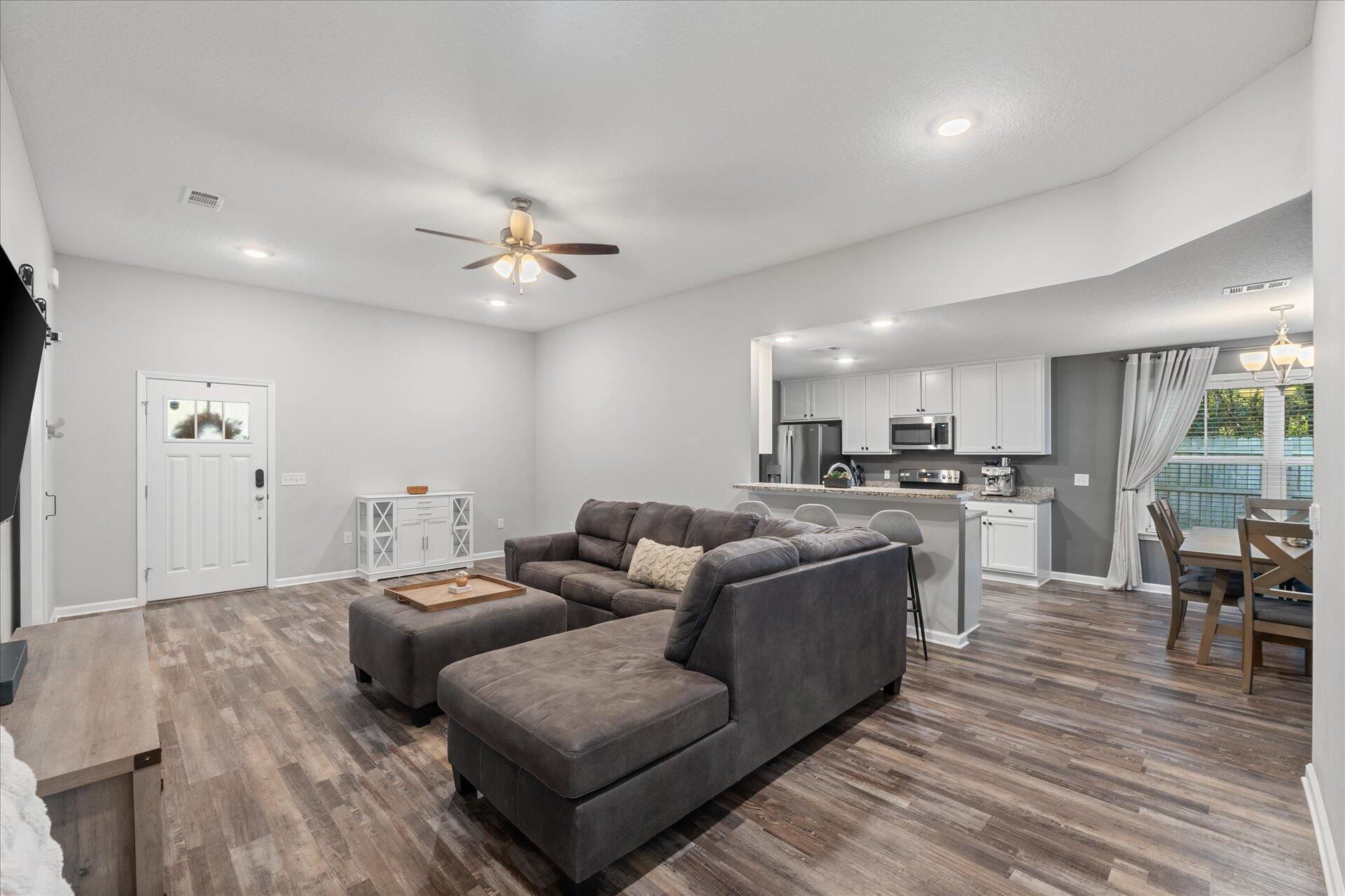 6052 Eden Road Crestview, FL 32539 - Photo 2 of 42 a living room with furniture and kitchen view