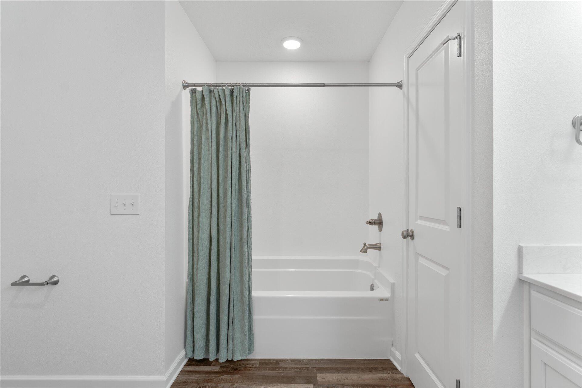 6052 Eden Road Crestview, FL 32539 - Photo 24 of 42 a bathroom with a shower and a glass door