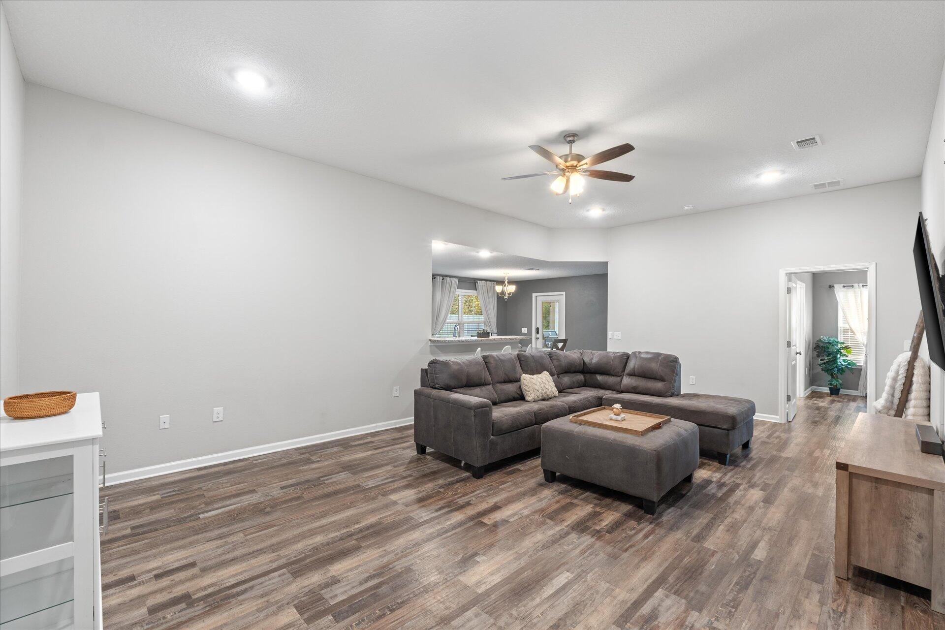 6052 Eden Road Crestview, FL 32539 - Photo 26 of 42 a living room with furniture and ceiling fan