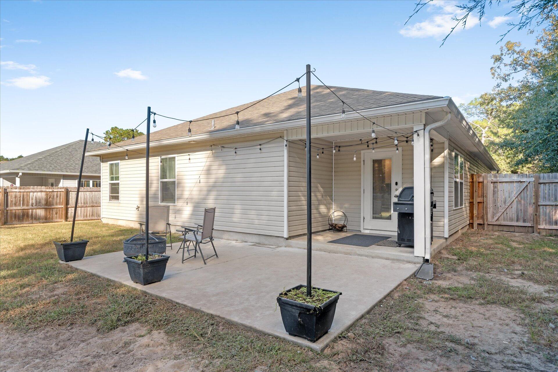 6052 Eden Road Crestview, FL 32539 - Photo 30 of 42 a front view of a house with a porch