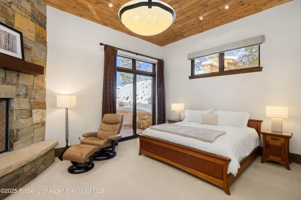 a bedroom with a bed and furniture