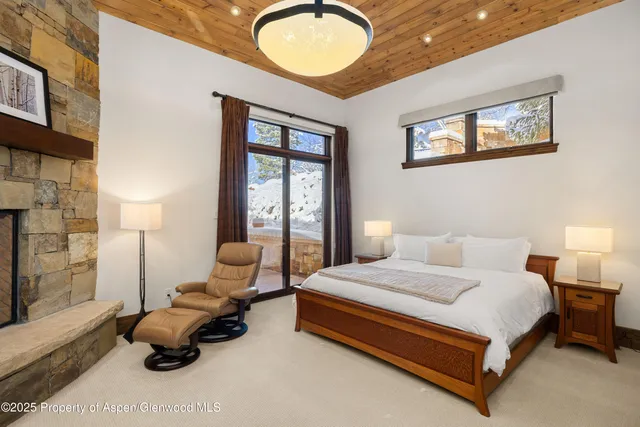 a bedroom with a bed and furniture