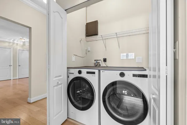 a view of livingroom with washer and dryer