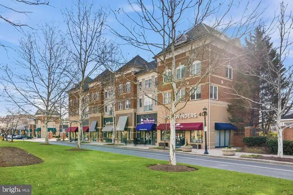 a view of a building with a yard