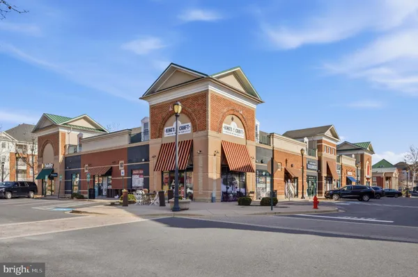 a view of a street with a building in the background