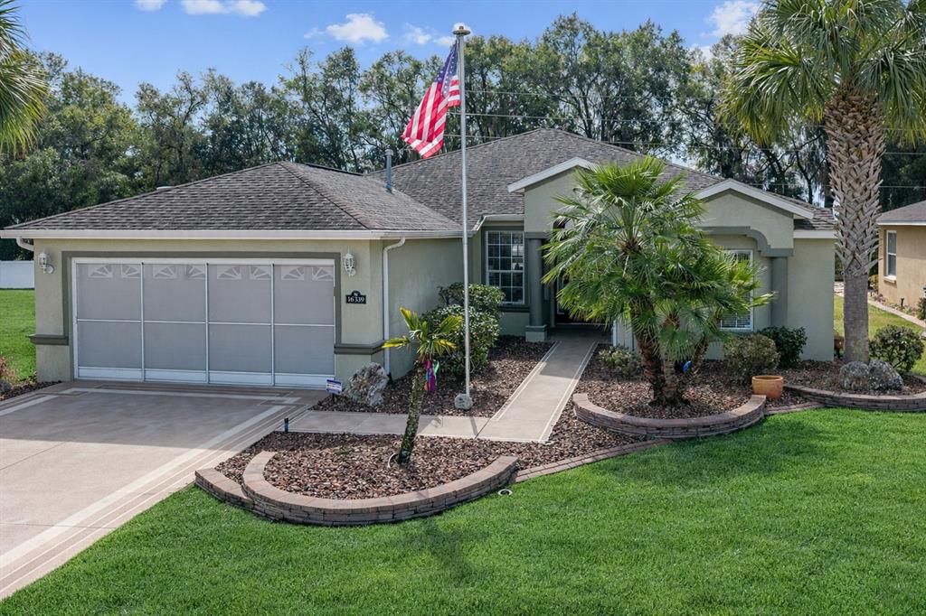 16339 Southwest 14th Avenue Road Ocala, FL 34473 - Photo 4 of 22 a view of a house with a yard corridor