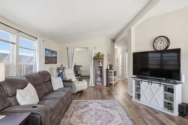 a living room with furniture and a couch