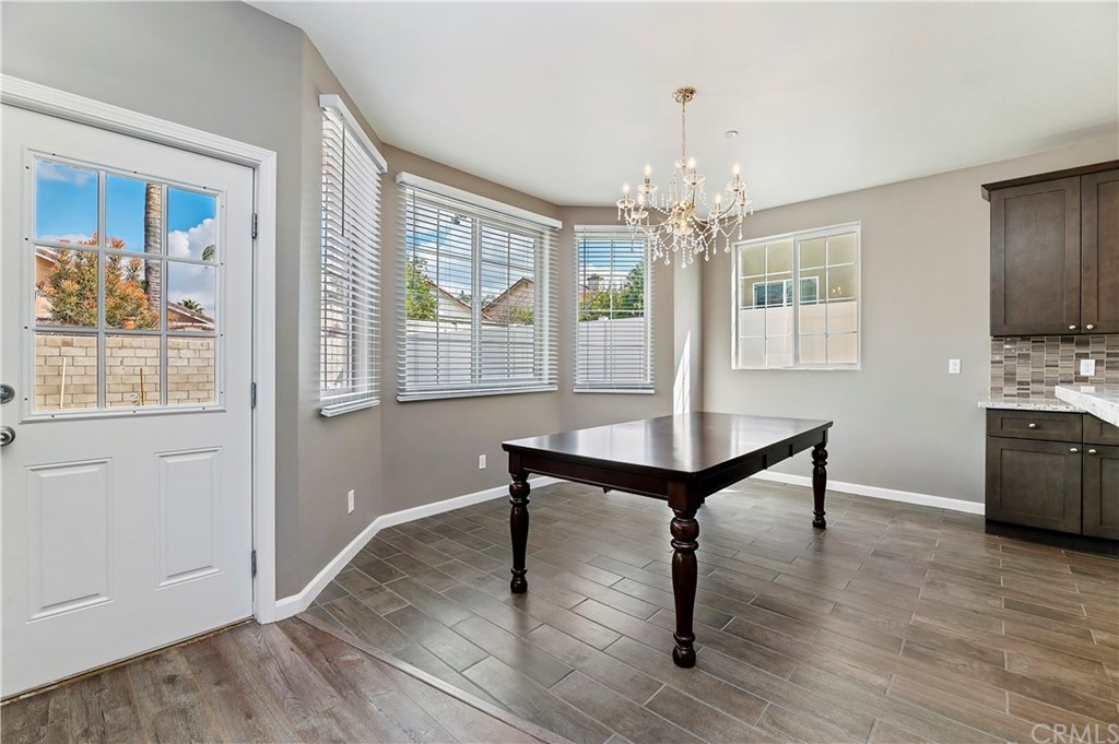 3591 Tyco Drive Riverside, CA 92501 - Photo 14 of 30 a view of a room with furniture window and wooden floor