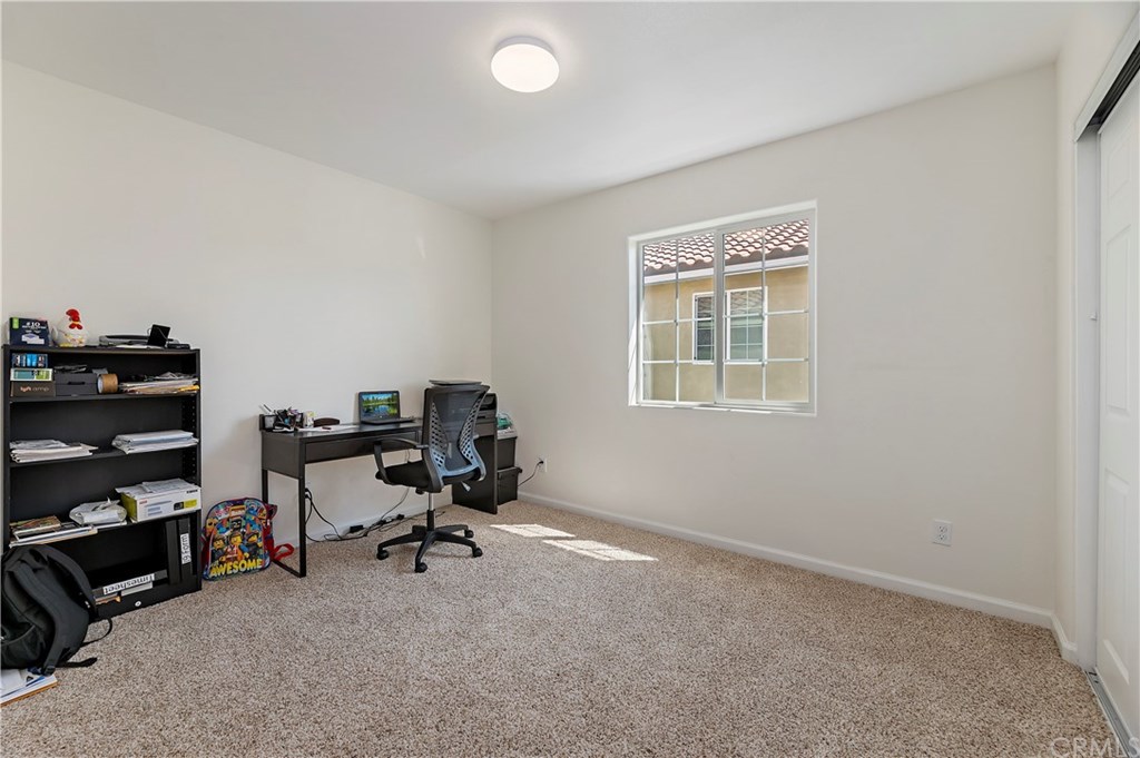 3591 Tyco Drive Riverside, CA 92501 - Photo 23 of 30 a view of a workspace with furniture and a window