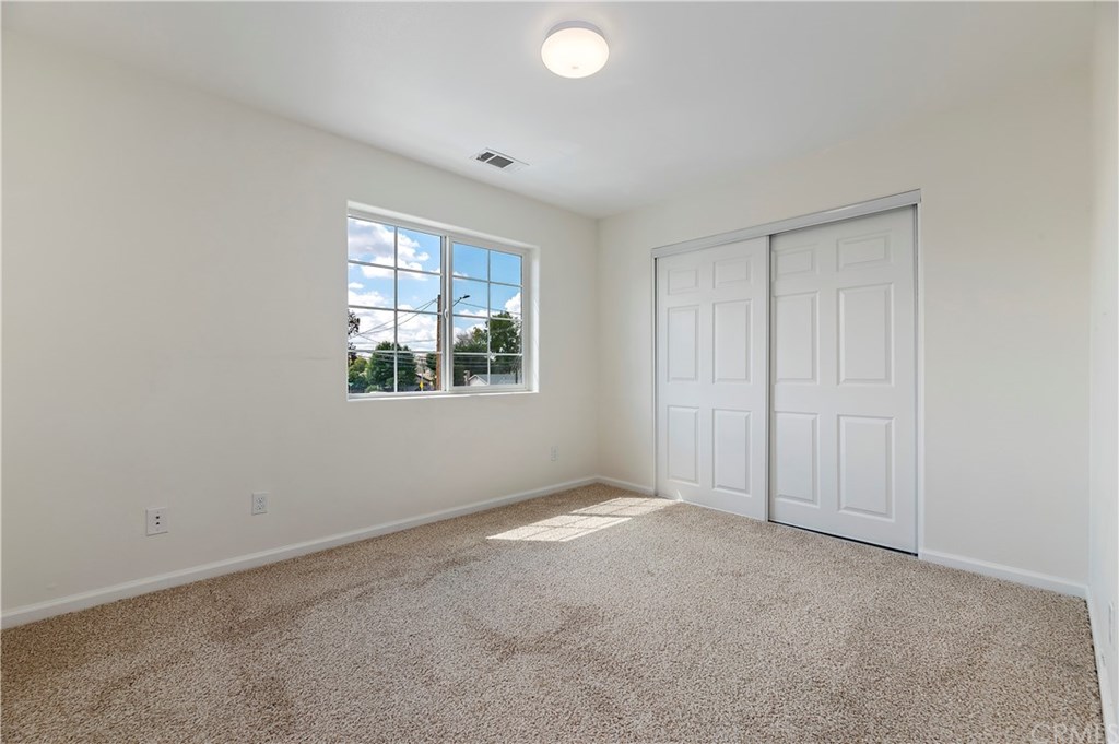 3591 Tyco Drive Riverside, CA 92501 - Photo 25 of 30 an empty room with windows
