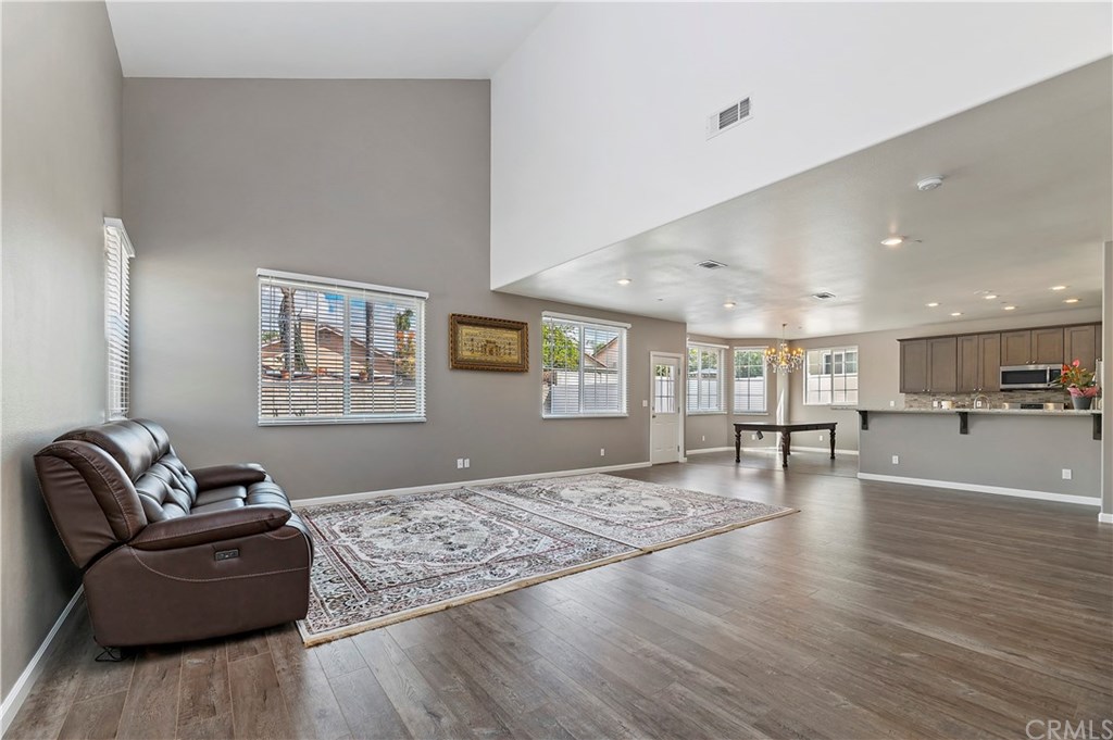 3591 Tyco Drive Riverside, CA 92501 - Photo 7 of 30 a living room with furniture and wooden floor