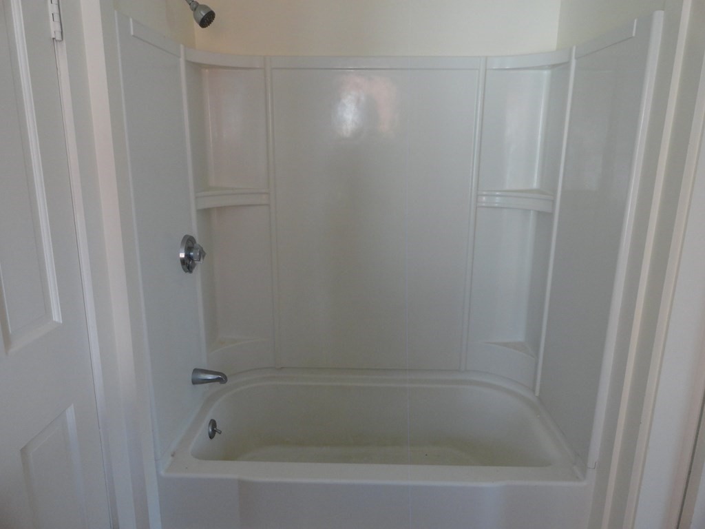 258 Main Street Townsend, MA 01469 - Photo 22 of 23 a close view of a bathtub in bathroom