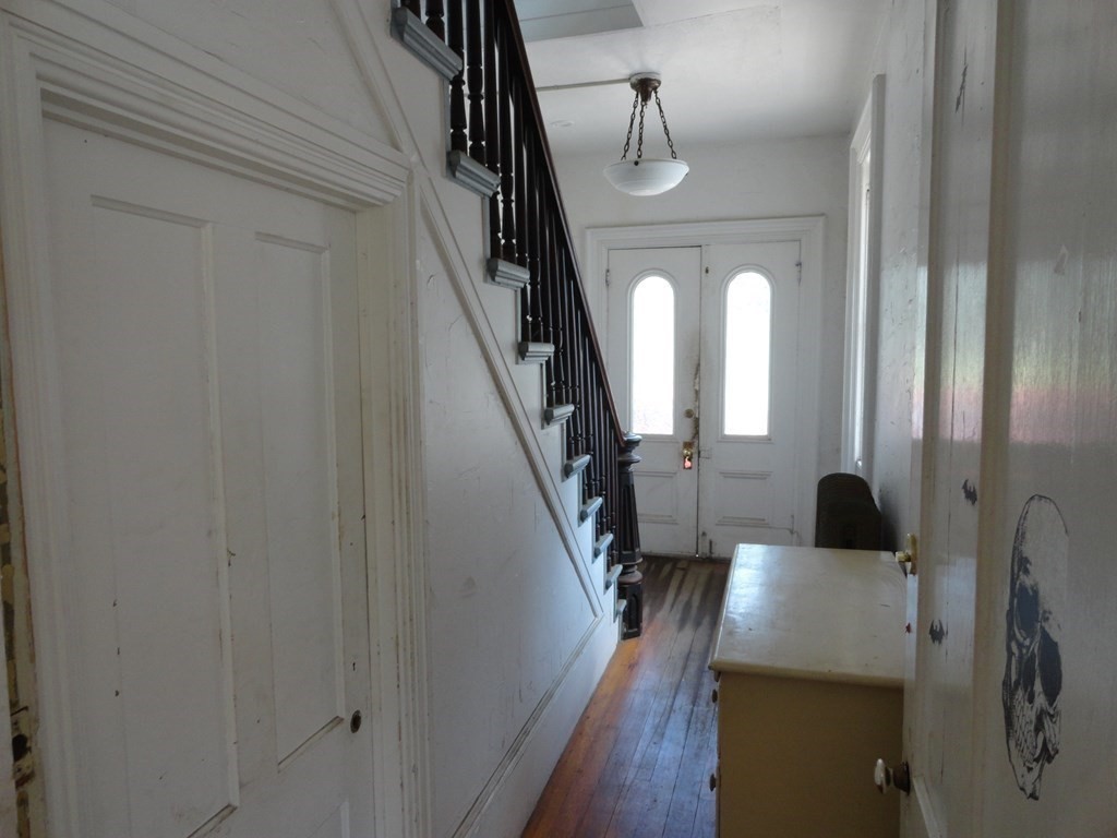 258 Main Street Townsend, MA 01469 - Photo 3 of 23 a view of a livingroom with furniture and staircase