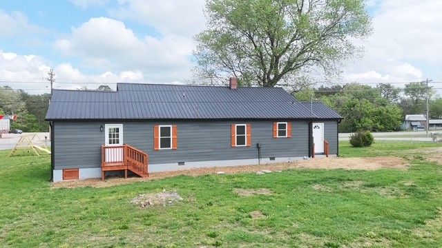 1263 Highway 100 Centerville, TN 37033 - Photo 17 of 17 a house view with a garden space