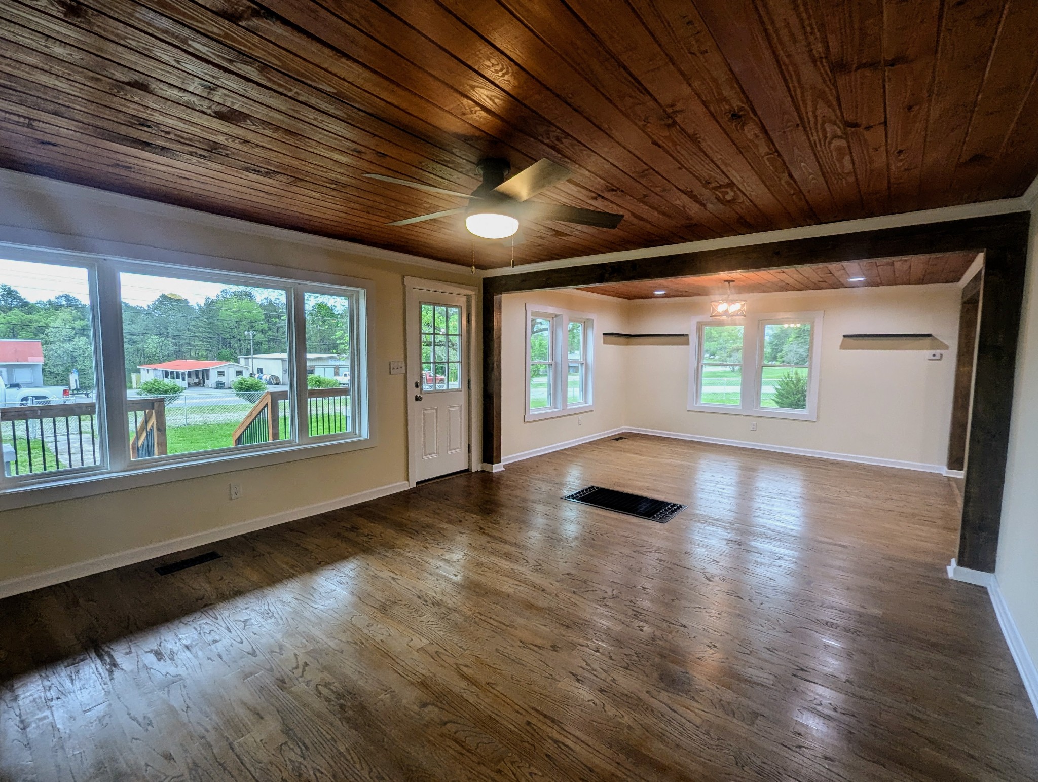 1263 Highway 100 Centerville, TN 37033 - Photo 2 of 17 a view of empty room with wooden floor and fan