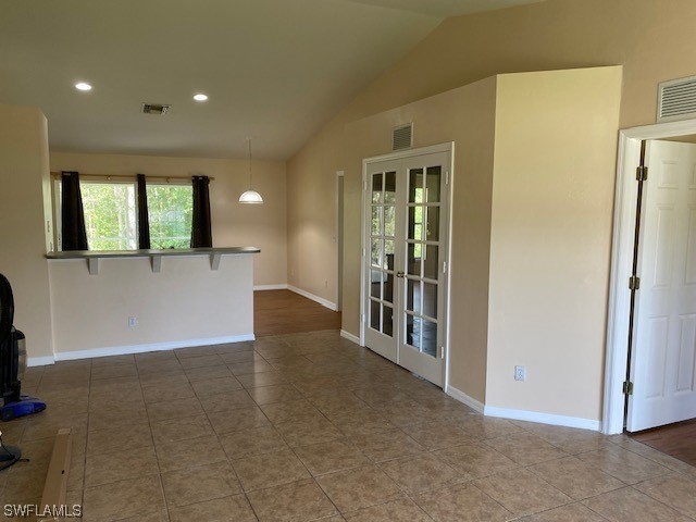 247 Rue Labonne Road Fort Myers, FL 33913 - Photo 3 of 14 a view of a hallway with wooden floor and cabinet
