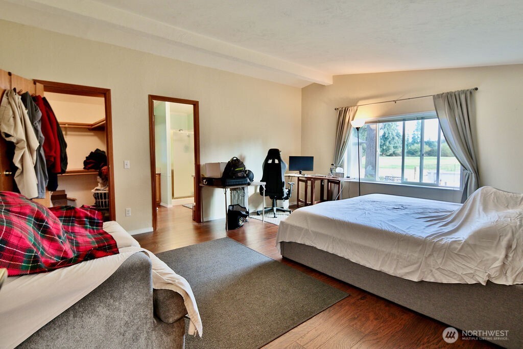 161 Fircrest Drive Sequim, WA 98382 - Photo 22 of 33 a bed room with a bed and a couch