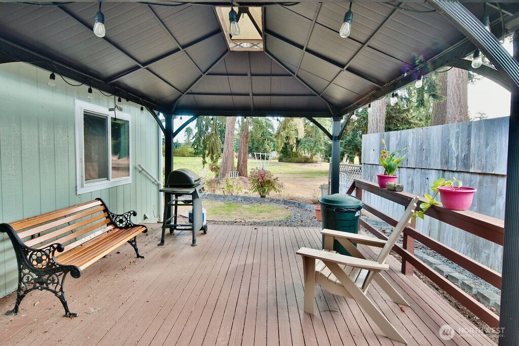 161 Fircrest Drive Sequim, WA 98382 - Photo 27 of 33 a sitting area with furniture and wooden deck