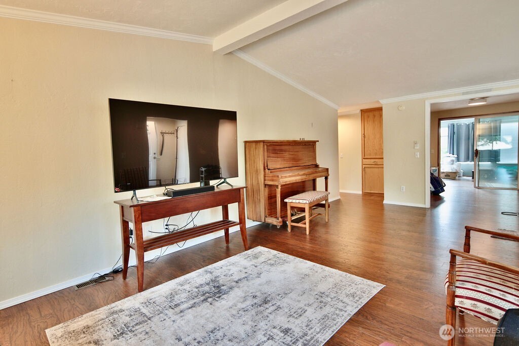 161 Fircrest Drive Sequim, WA 98382 - Photo 6 of 33 a living room with furniture and a wooden floor
